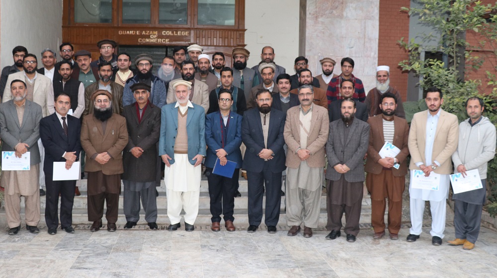 Pro-Vice Chancellor and Registrar , UoP are posing for a group photo with the trainers and participants of five day workshop on E-Office deployment at QACC premises on 21st Jan, 2020.